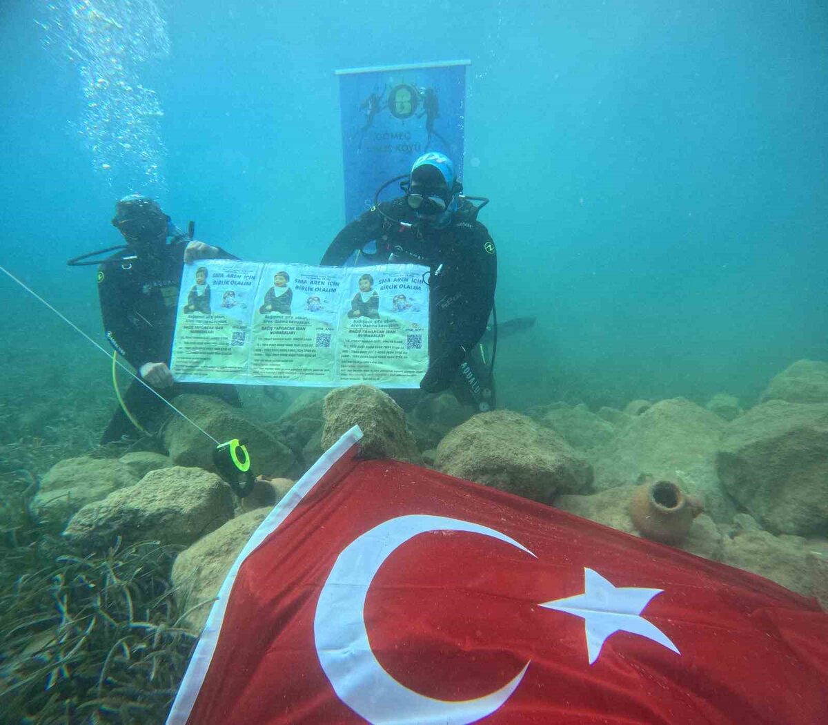 SMA’lı Aren bebek için deniz altında bayrak açtılar